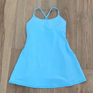 Light Blue Strappy Dress with shorts underneath.
